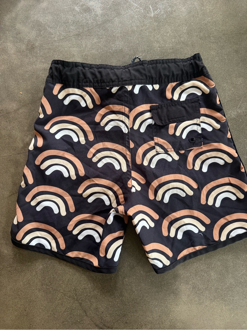 Kids Black Swim Trunks with Peach & White Rainbow Print. Good preowned condition